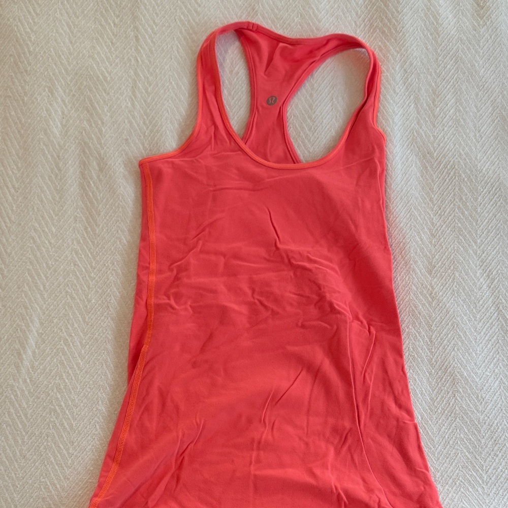 Lululemon women’s bright coral orange work out top